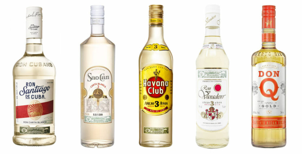 alcune bottiglie di rum ideali per la preparazione della Piña Colada: Santiago de Cuba, Sao Can, Havana Club, Varadero, Don Q